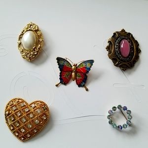 Custom jewelry pins and brooches.